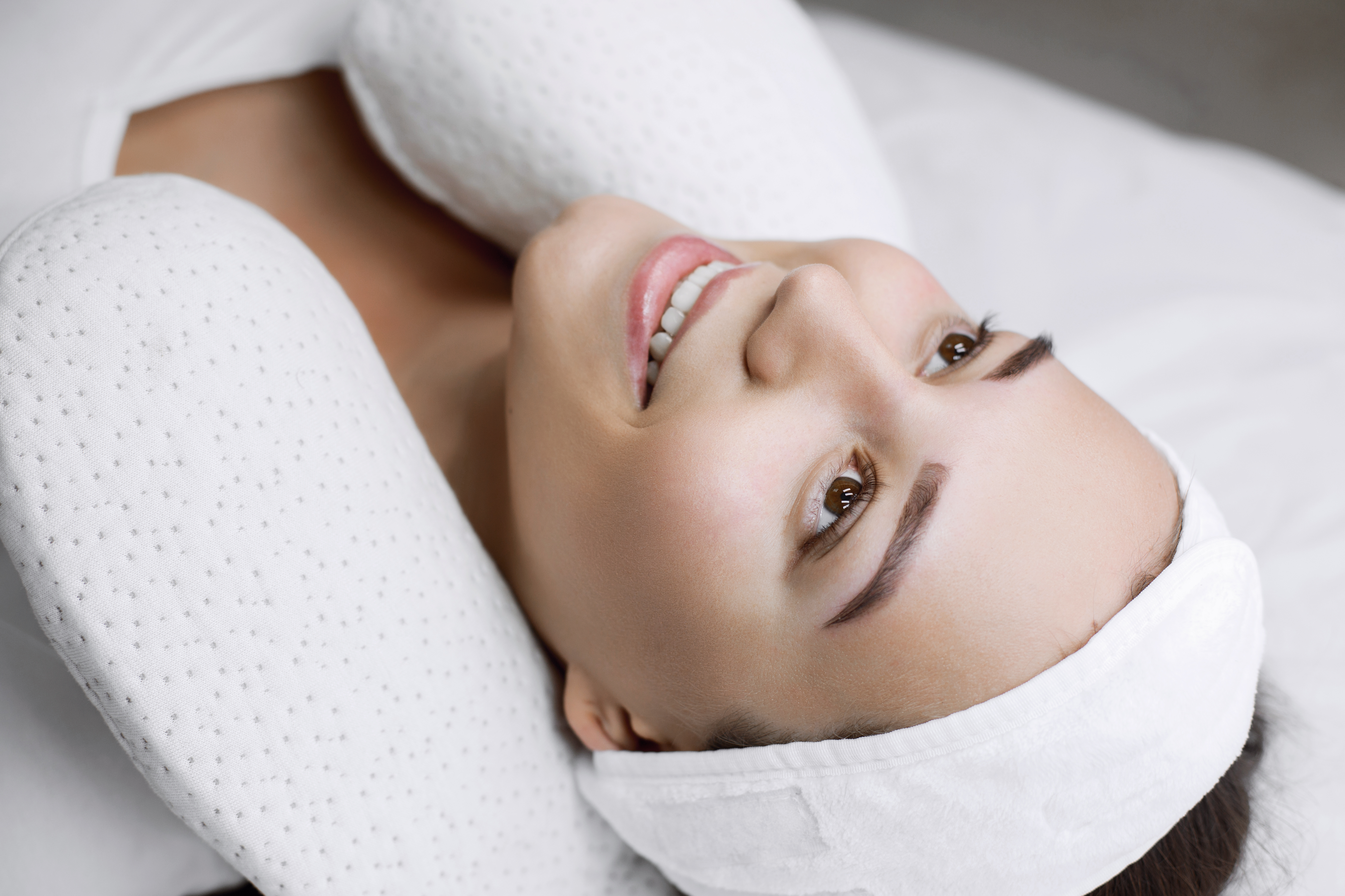 Young lady getting facial treatment.