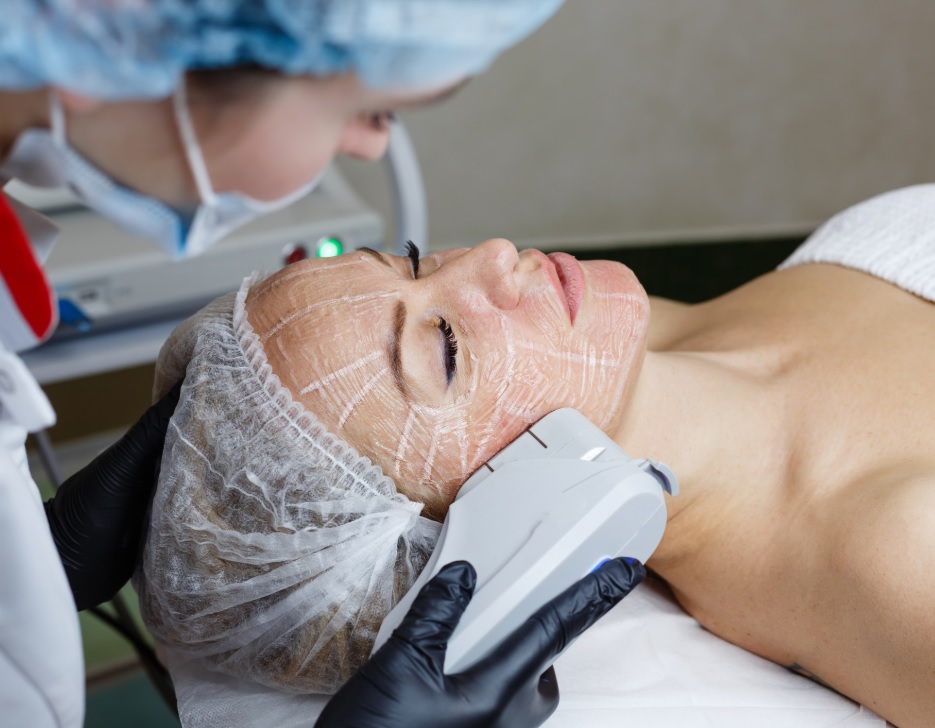 Lady recieving High-Intensity Focused Ultrasound treatment